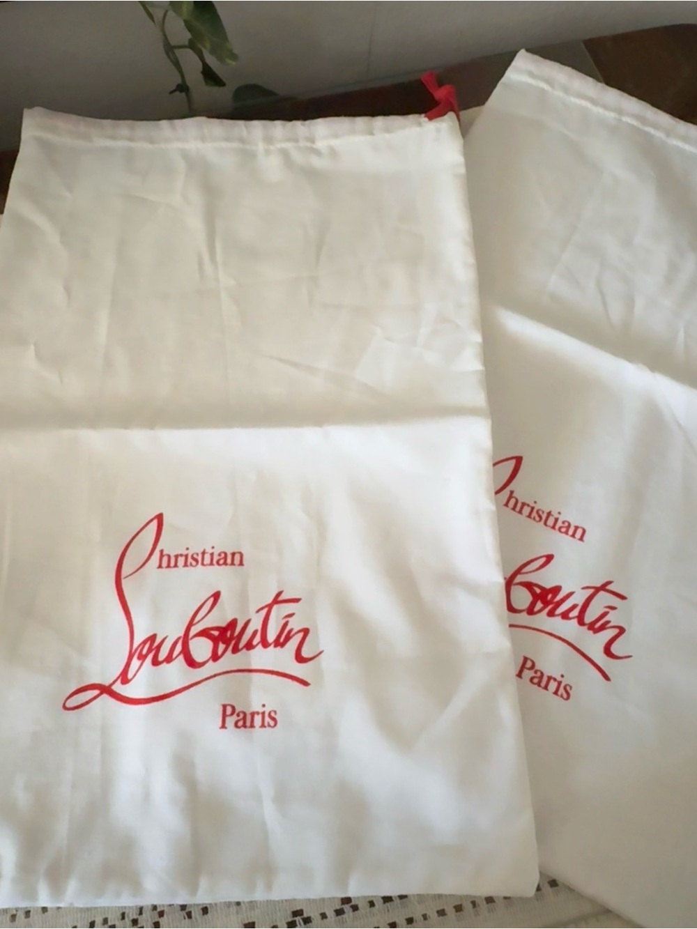 Christian Louboutin White Dust Bags with Red Logo Pair